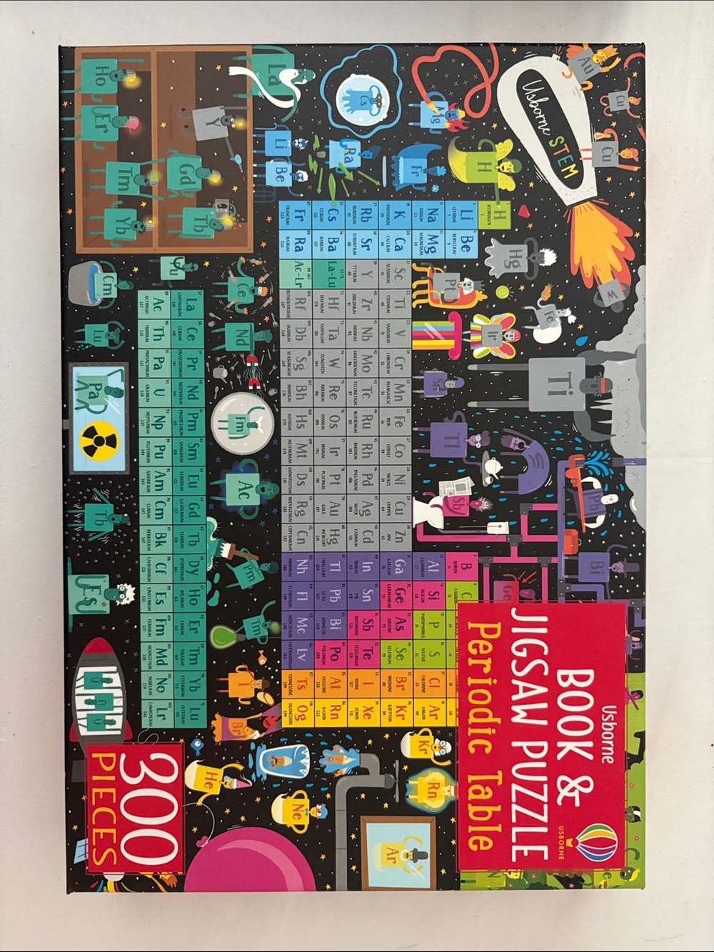New. Never opened. Usborne Periodic Table Jigsaw Puzzle Book